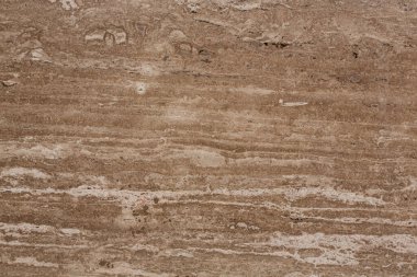 Kahverengi doğal taştan levha yakın plan..