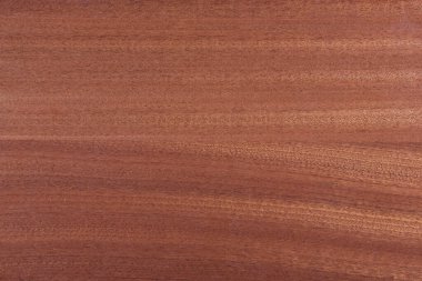 Doğal kırmızı ahşap kaplama dokusuna yakın plan..