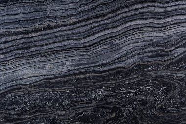 Şık siyah renkte mükemmel bir mermer arka plan. Sanat projelerinde astexture kullanılabilir.