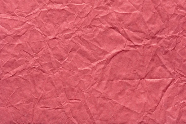 あなたの挨拶のギフトの一部として飽和ピンク色のしわ紙の背景. — ストック写真