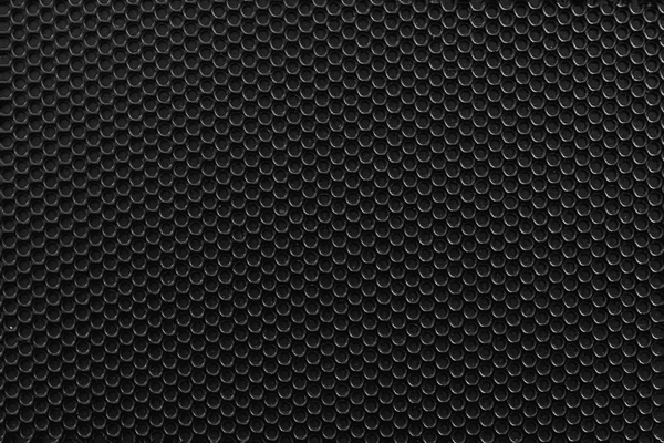 Черный металлический фон с отверстиями . — стоковое фото