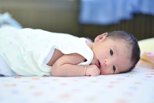 Asian newborn baby on the bed — Stock Photo, Image