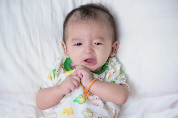 Asian baby on the bed — Stock Photo, Image