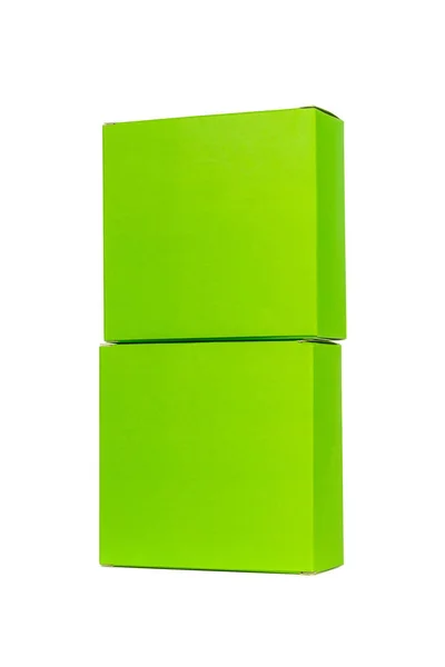 Cajas verdes apiladas o cajas de papel verde aisladas en blanco — Foto de Stock
