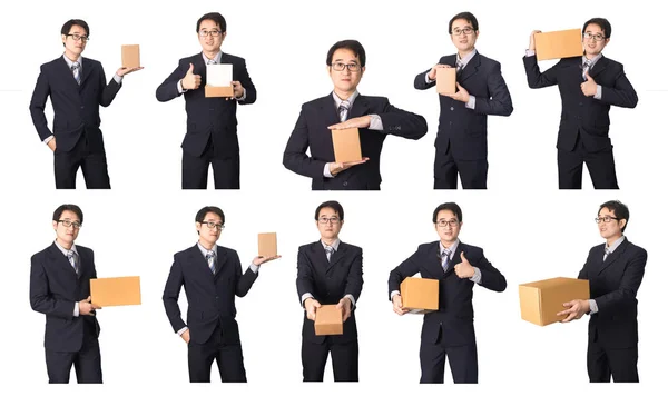 Conjunto de hombre de negocios asiático con paquete de producto en manos aisladas — Foto de Stock