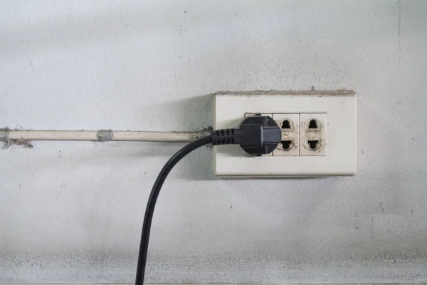 Close-up of old socket, electrical outlet with plug — Stock Photo, Image