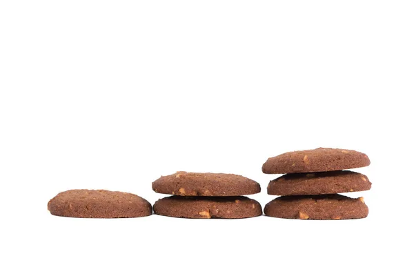 Pilha de biscoitos de manteiga de castanha de caju de chocolate isolado na parte traseira branca — Fotografia de Stock