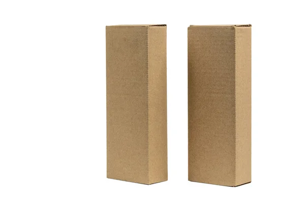Két csomag barna kartondoboz hosszú elemek. Makett, elszigetelt — Stock Fotó