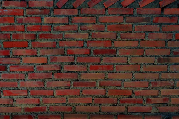 Ladrillo rojo grunge pared fragmento fondo . — Foto de Stock
