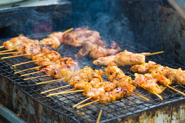Chicken grill over the small flame. — Stock Photo, Image