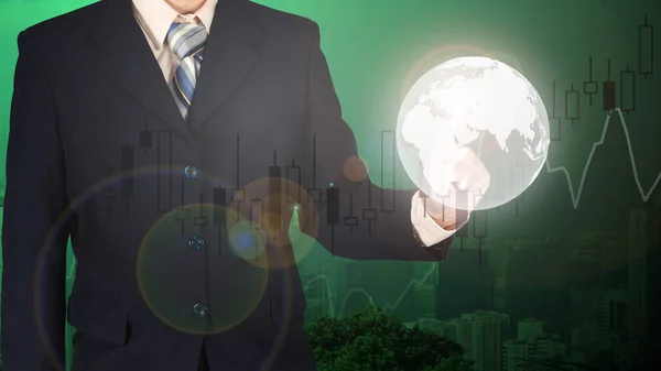 Double exposure of the world on businessman hand cityscape blurr