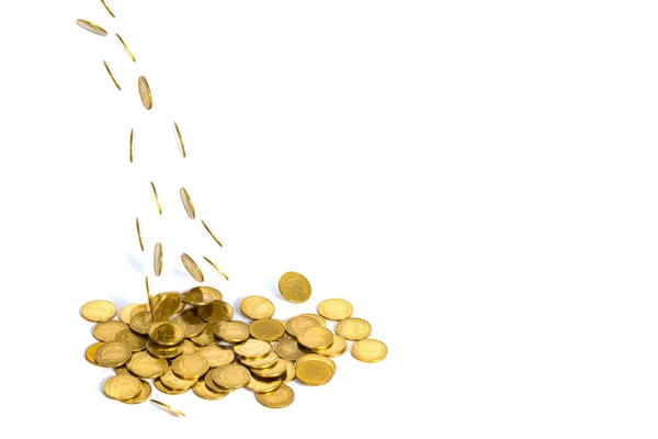 Cayendo monedas de oro. Dinero sobre un fondo blanco . — Foto de Stock