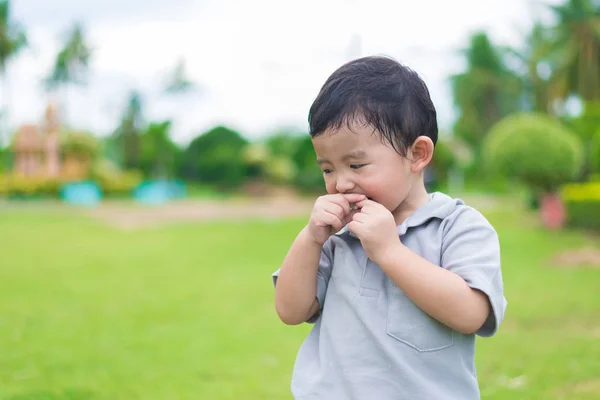 Little Asian kid at the playground under the sunlight, shallow D — Stock Photo, Image