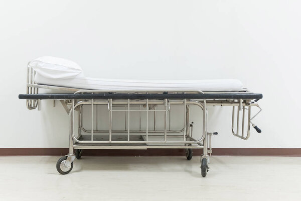 Empty stretcher trolley or hospital trolley for patient with whi