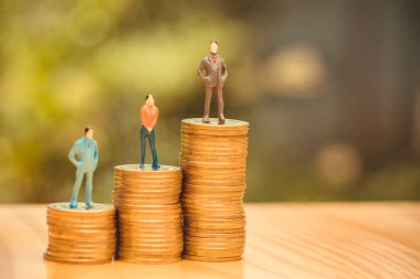 Minyatür insanlar, küçük rakamlar işadamları ve kadın üstüne 