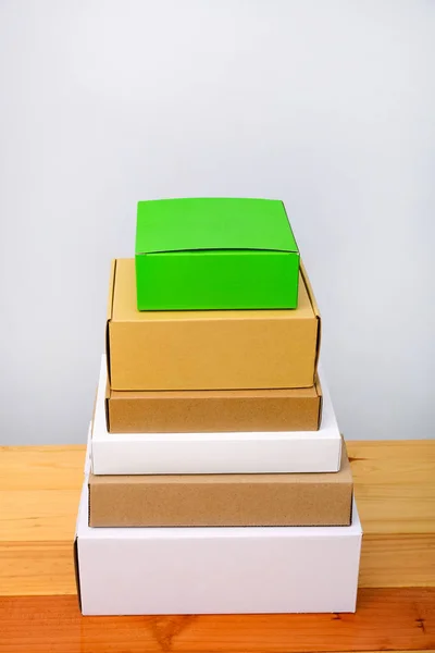 Group of cardboard box different color and size, pile of package — Stock Photo, Image