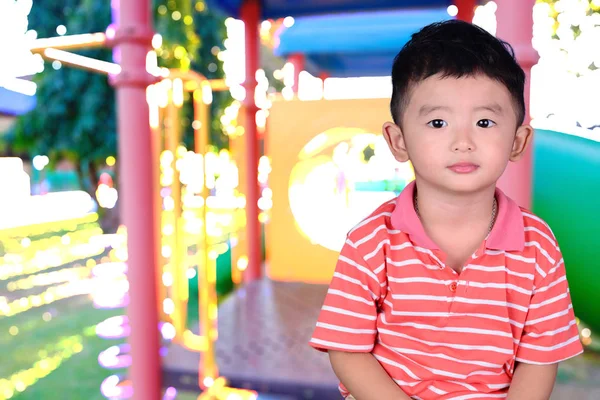 Double exposure of little Asian happy boy smile on blur image of — Stock Photo, Image