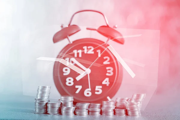 Double exposure alarm clock and step of coins stacks on working — Stock Photo, Image