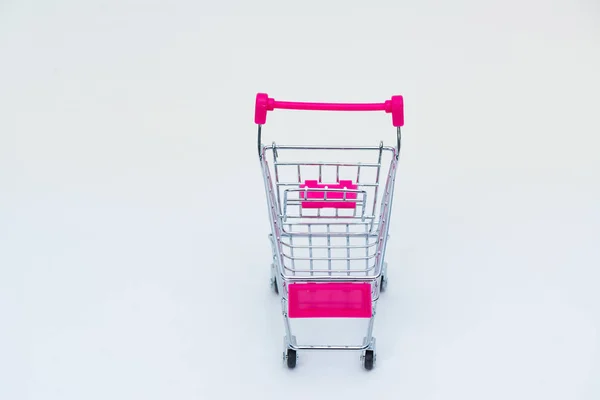 Shopping cart eller stormarknad vagn på vit bakgrund, affä — Stockfoto