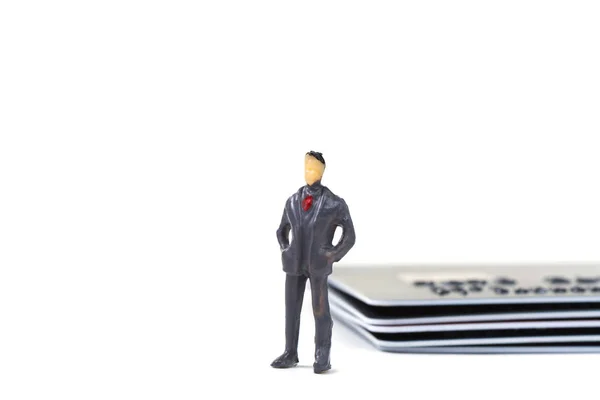 Figurine homme d'affaires miniature ou de petites personnes debout avec pile — Photo
