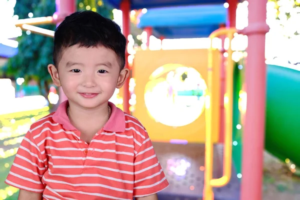 Double exposure of little Asian happy boy smile on blur image of — Stock Photo, Image