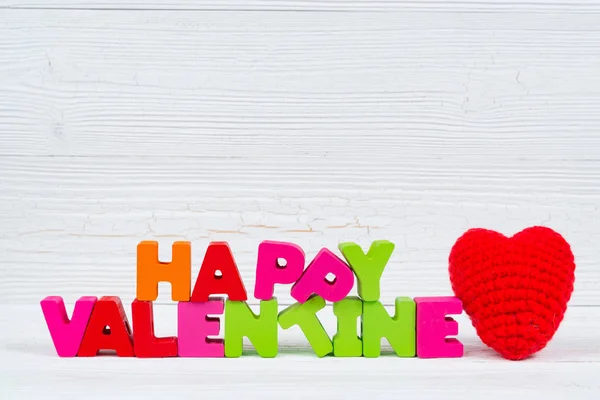 Valentine karty z szczęśliwy valentine dzień tekst i czerwony dziania on — Zdjęcie stockowe