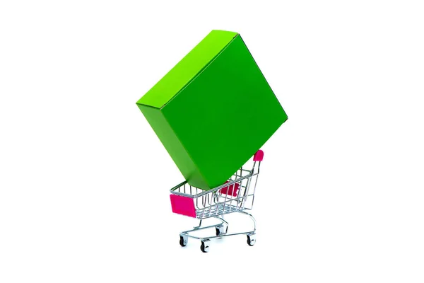 Green box and shopping cart or supermarket trolley isolated on w — Stock Photo, Image