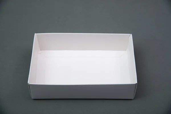 Empty Package white cardboard box or tray  for product on grey b — Stock Photo, Image