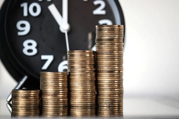 Step of coins stacks and alarm clock with tablet computer and fi — Stock Photo, Image