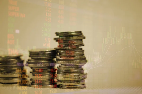 Double exposure of coin stack with stock market screen chart boa — Stock Photo, Image