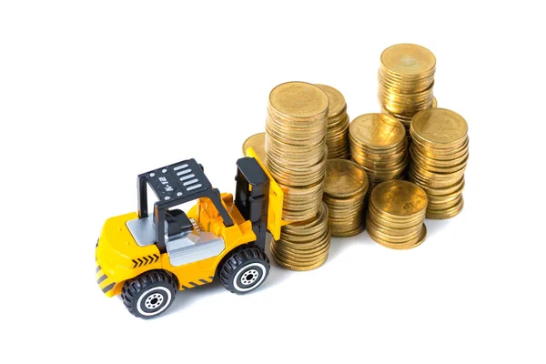 Mini-Gabelstapler belädt Münze mit Goldmünze, — Stockfoto
