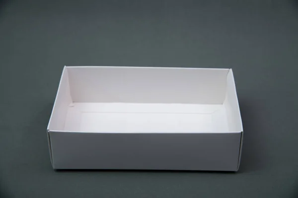 Empty Package white cardboard box or tray  for product on grey b — Stock Photo, Image