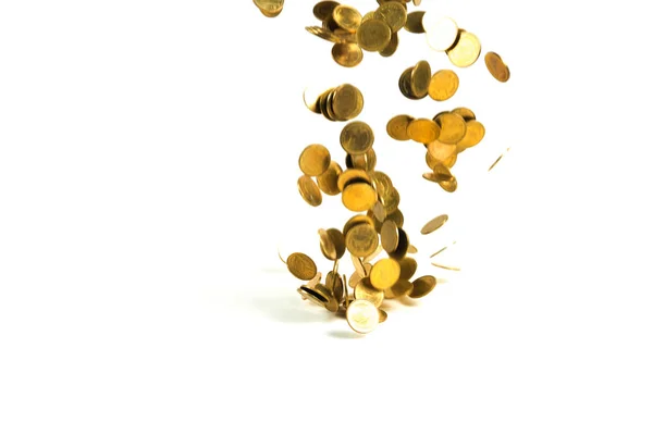 Padající zlaté mince peníze izolovaných na bílém pozadí, Bušín — Stock fotografie