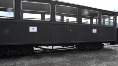 walking along the retro train, Old steam locomotive close-up, Steam narrow gauge train, Steam train chugging through the countryside, narrow-gauge railway