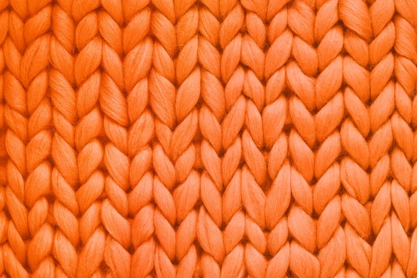 Textuur van oranje wol grote gebreide deken. Groot breiwerk. Plaid merino wol. Bovenaanzicht — Stockfoto