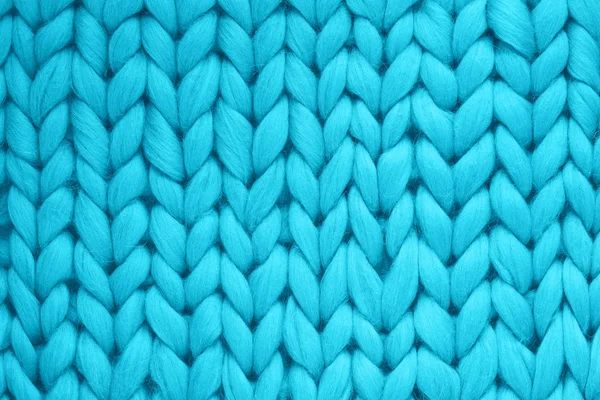 Textuur van blauwe wol grote gebreide deken. Groot breiwerk. Plaid merino wol. Bovenaanzicht — Stockfoto