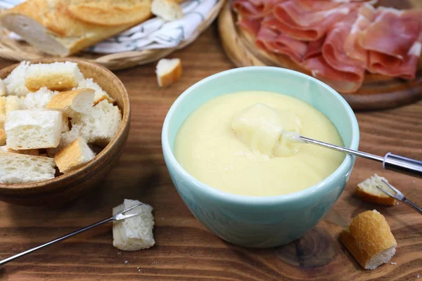 Traditional cheese fondue with baguette — Stock Photo, Image