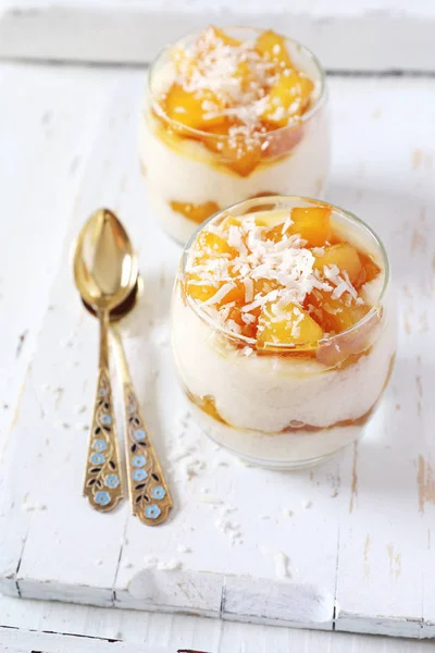 Two glass of homemade rice coconut milk cream  pudding with cara — Stock Photo, Image