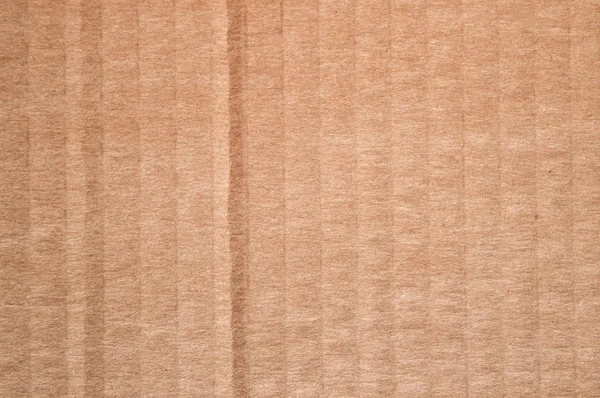 Doku temiz kahverengi karton kutunun. Dalgalı katlanmış kağıt doku