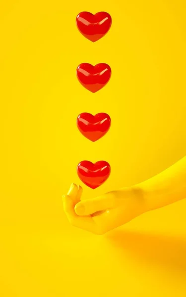 3d візуалізація ілюстрації жовтої руки, що тримає червоні серця. Частини людського тіла. Концептуальна сцена для проектів графічного дизайну. Блискучий пластиковий глянсовий матеріал . — стокове фото