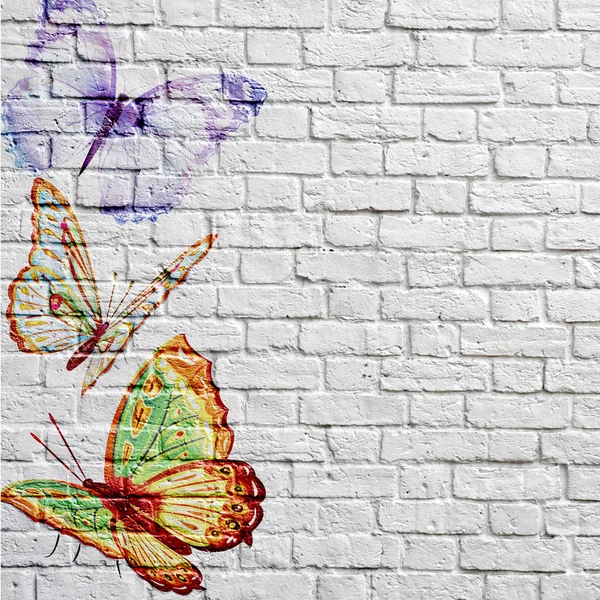 Graffiti beautiful butterflies on a brick wall — Stock Photo, Image