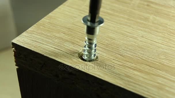 Tighten the screw close seup — стоковое видео
