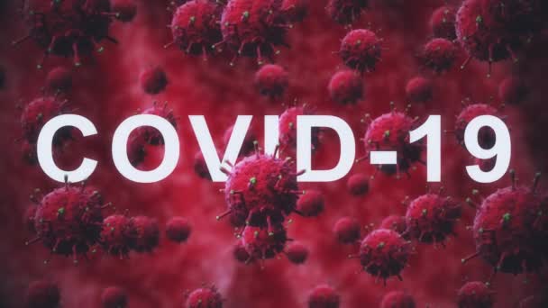 Надпись covid-19 появляется гладко на фоне зеленых бактерий или вирусов, клетки движутся медленно и вращаются — стоковое видео