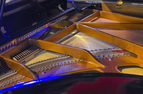 The internal mechanism of a piano