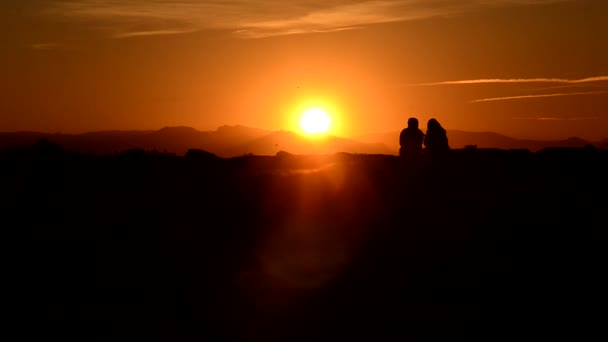 Couple and sunset — Stock Video