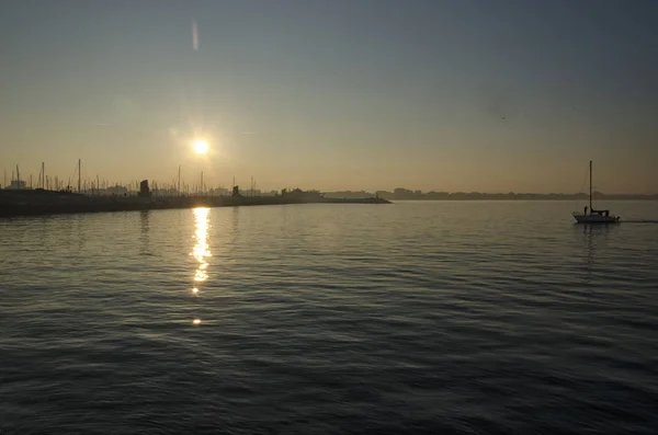 Захід сонця над портом Ріміні — стокове фото