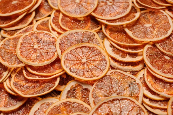 Pile of dried orange citrus circles and candied fruits — Stock Photo, Image