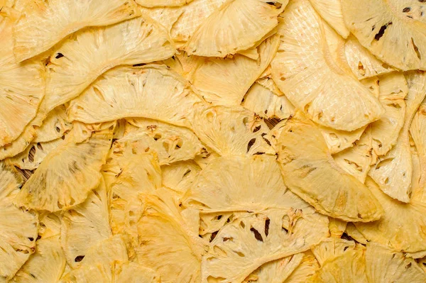 Dried pineapples take close-up background