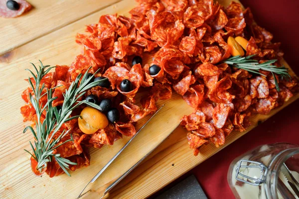 Top view of meat appetizer consisting of delicious salami plate — Stock Photo, Image