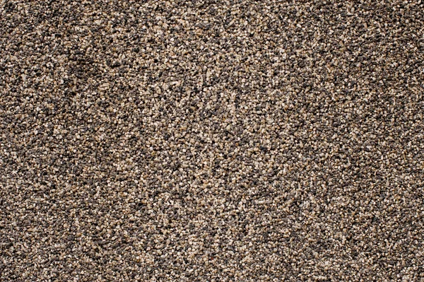 Texture background wallpaper of a large amount of grey pebbles stone — Stock Photo, Image